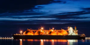 LNG TANKER AT THE GAS TERMINAL - Sunrise over the sea