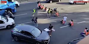 Portuguese climate roadblock cleared by furious motorists.