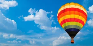 hot air balloon with beautiful blue sky and nice cloud in Thailand.