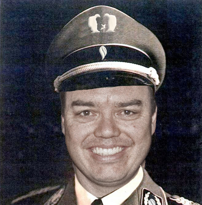 This image has an empty alt attribute; its file name is herr_john_cook_head.jpg