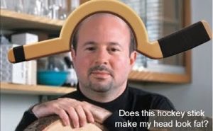 Michael-Mann-Hockey-Stick-on-Head