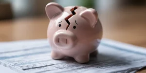 charlesrotter_A_Broken_Piggy_Bank_on_Top_of_an_Electricity_Bill_midjourney