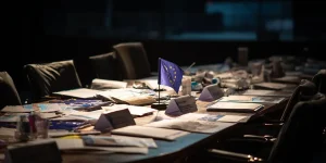charlesrotter_An_abandoned_conference_table_covered_in_COP_30_8e52705midjourney